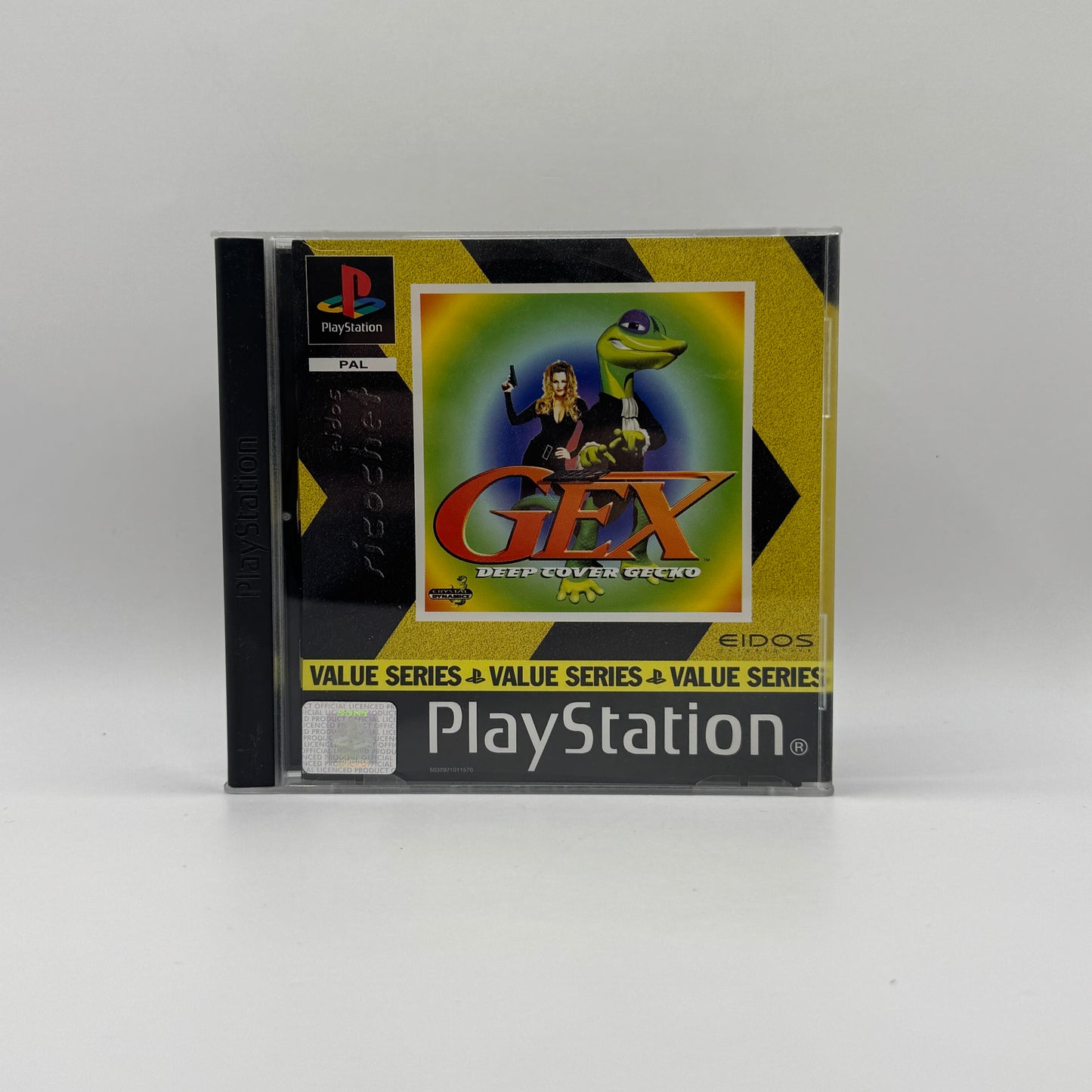 Verpackung des PS1-Spiels Gex: Deep Cover Gecko, ein 3D-Platformer mit dem Gecko Gex, der durch verschiedene Level reist, Gegner besiegt und humorvolle Popkultur-Anspielungen bietet.