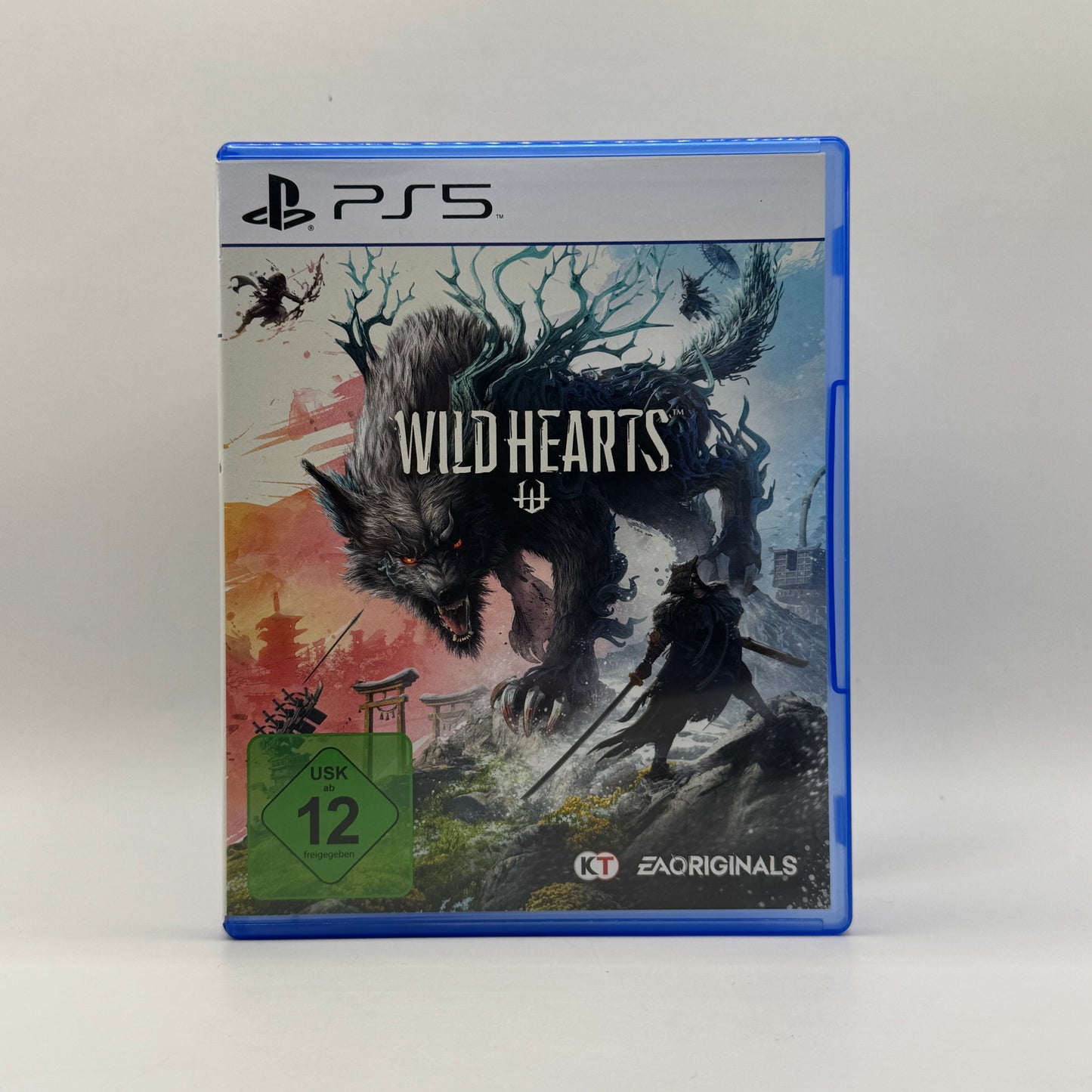 Verpackung des PS5-Spiels Wild Hearts, ein Action-Rollenspiel, in dem Spieler riesige Kreaturen jagen, Waffen herstellen und in einer fantastischen Welt Missionen absolvieren.