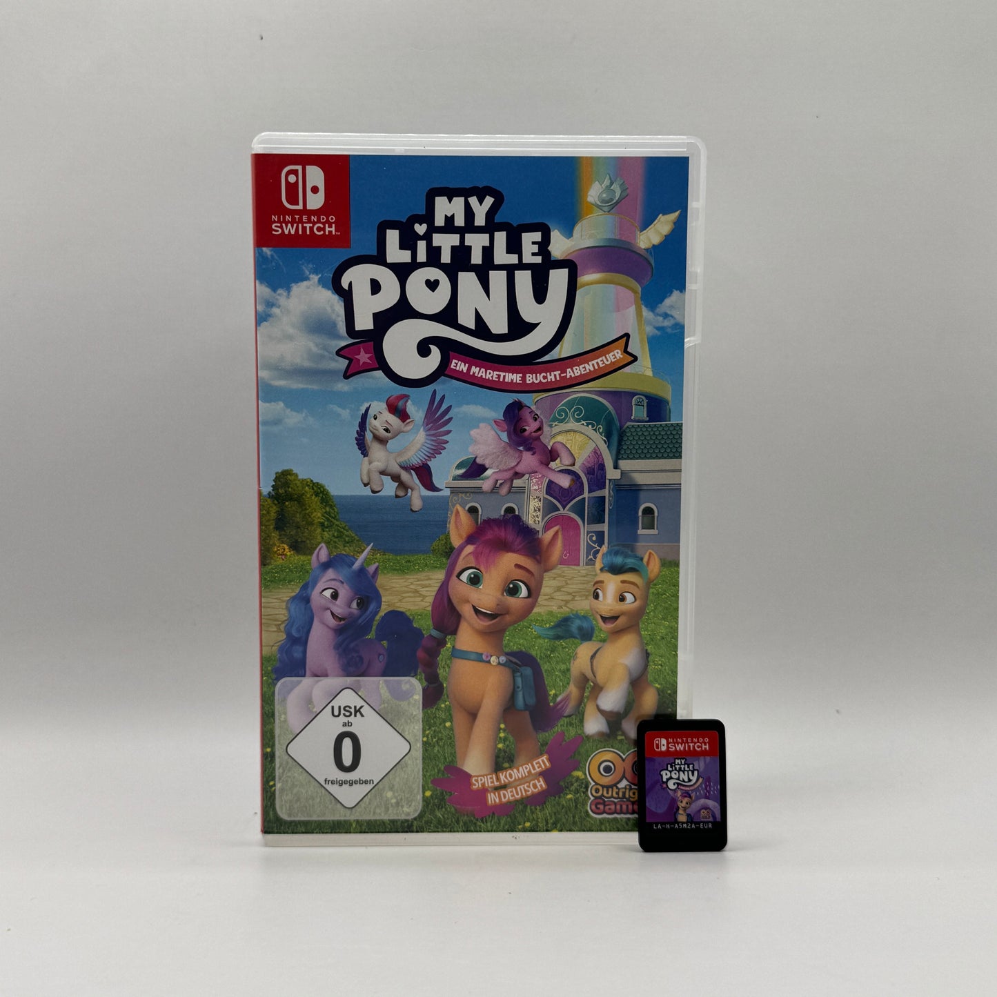 Verpackung des Nintendo Switch-Spiels My Little Pony: Ein Maretime Bucht-Abenteuer, ein Abenteuer- und Rollenspiel, in dem Spieler als Pony-Charaktere Aufgaben erfüllen, Freunde treffen und die Welt von Maretime Bay erkunden.