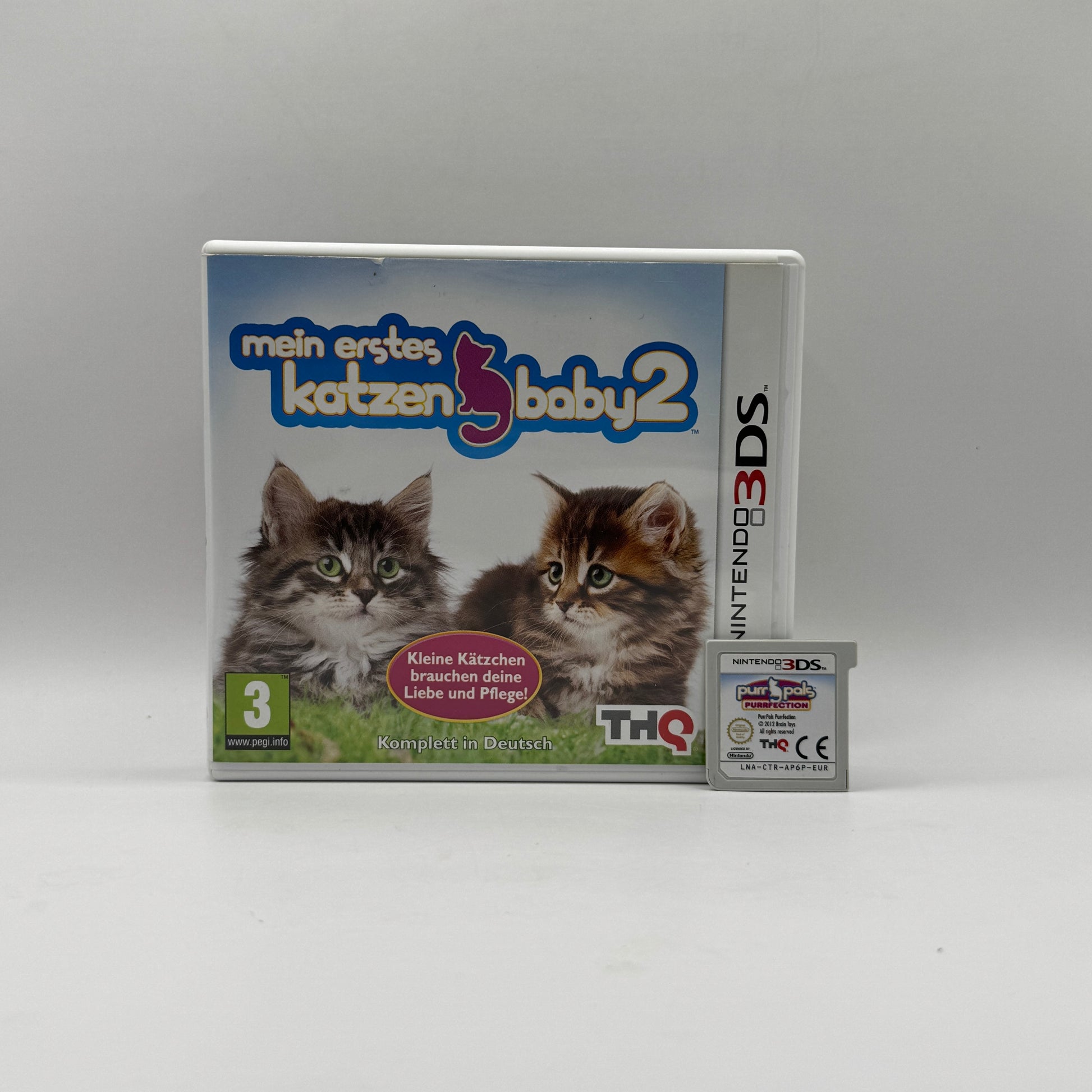 Verpackung des Nintendo 3DS-Spiels Mein erstes Katzenbaby 2, ein Simulationsspiel, in dem Spieler sich um niedliche Katzenwelpen kümmern, sie füttern, pflegen und spielen lassen.
