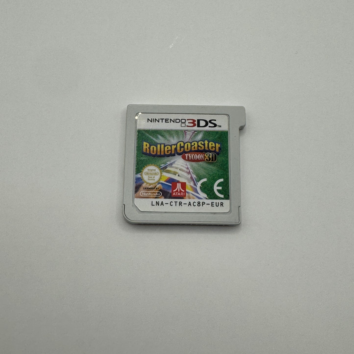 Modul des Nintendo 3DS-Spiels RollerCoaster Tycoon 3D ohne Originalhülle, ein Simulationsspiel, in dem Spieler eigene Freizeitparks bauen, Achterbahnen gestalten und Besucher managen.