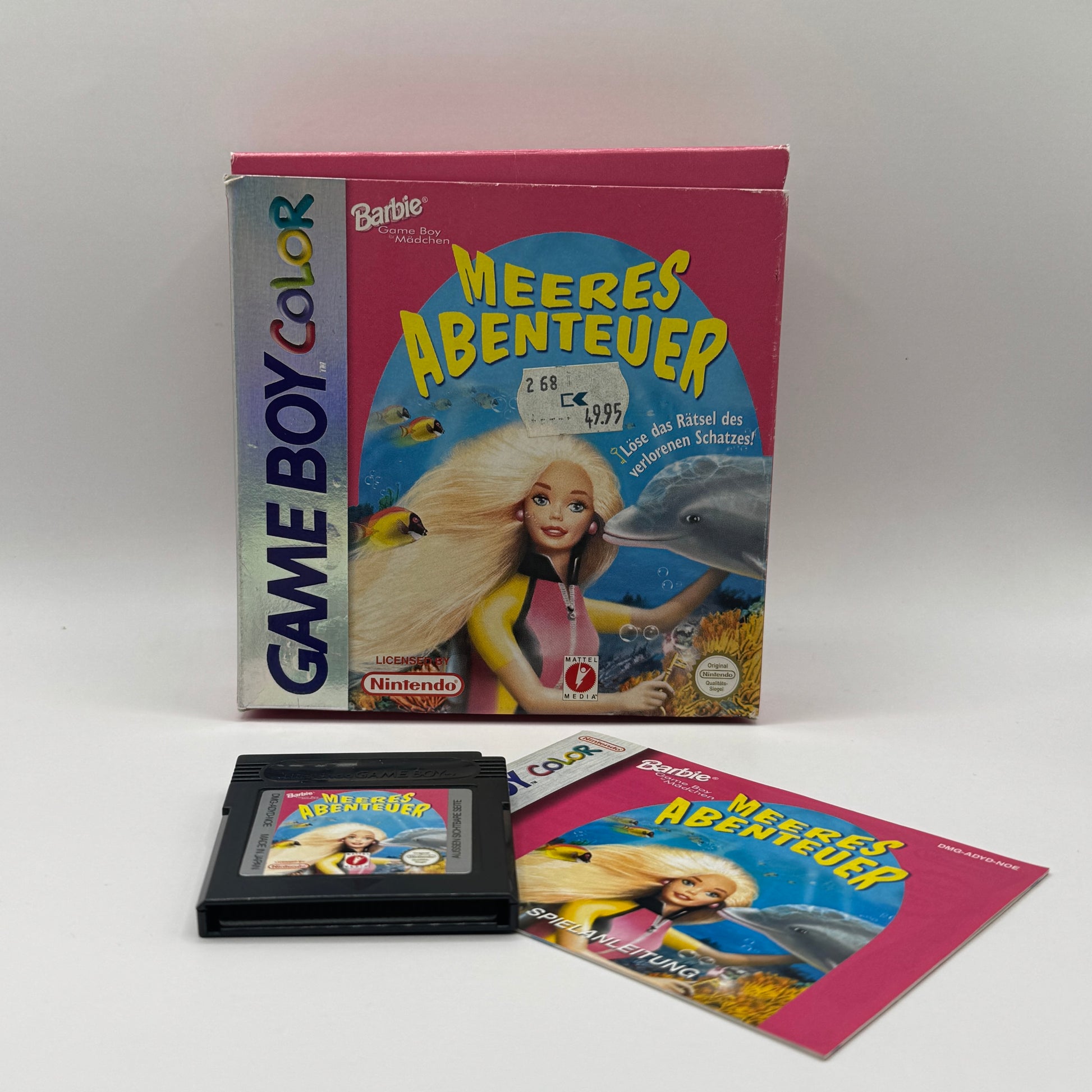 Verpackung des Spiels Barbie: Meeres Abenteuer, ein Abenteuerspiel, in dem Spieler mit Barbie die Unterwasserwelt erkunden, Meeresbewohner treffen und Aufgaben im Ozean lösen.