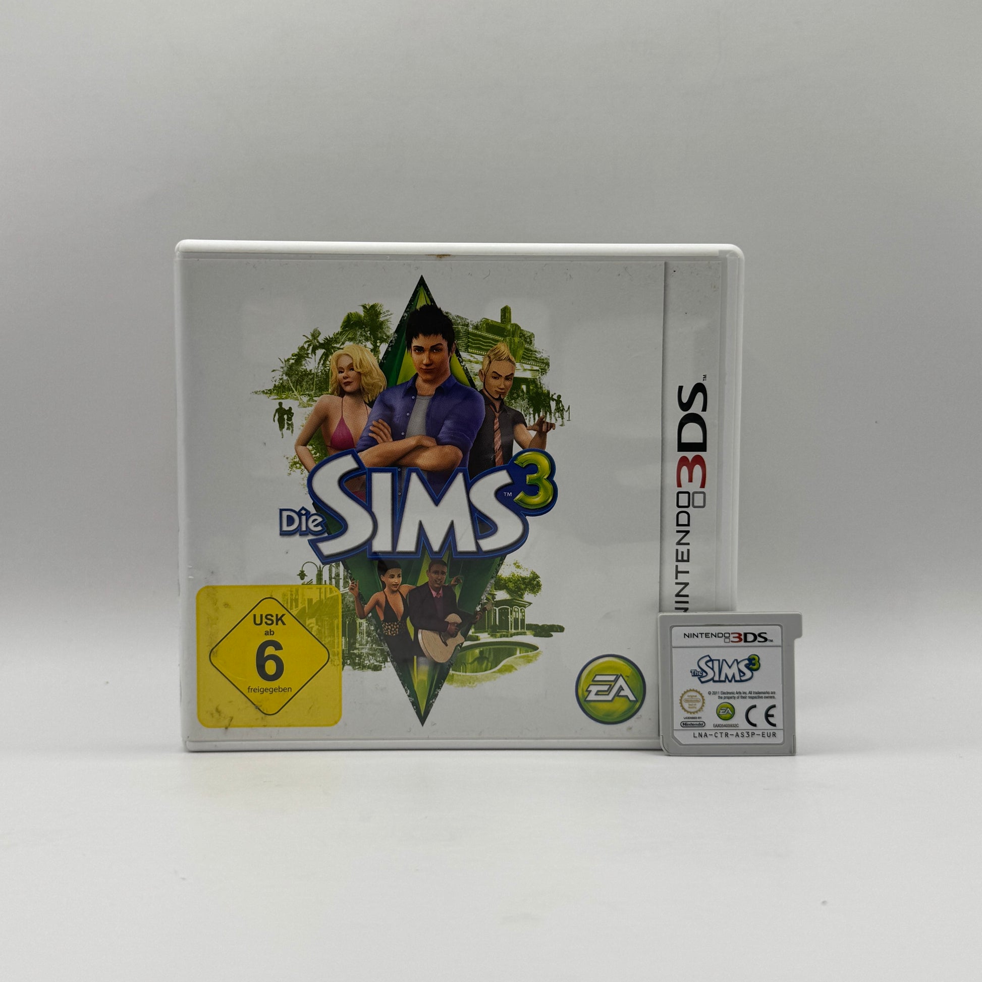 Verpackung des Nintendo 3DS-Spiels Die Sims 3, eine Lebenssimulation, in der Spieler eigene Sims erstellen, Häuser gestalten und ihr virtuelles Leben steuern können.