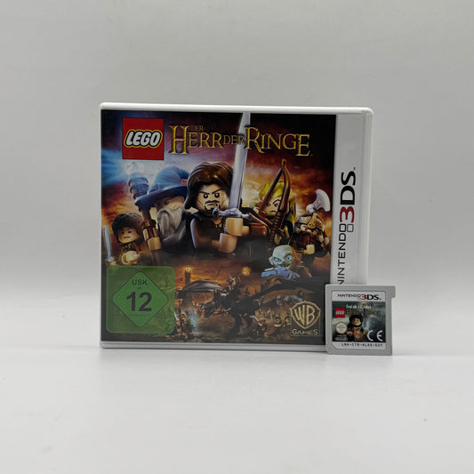 Verpackung des Nintendo 3DS-Spiels LEGO Der Herr der Ringe, ein Action-Adventure im LEGO-Stil, in dem Spieler die Geschichte der Filmtrilogie nachspielen, Rätsel lösen und Gegner bekämpfen.