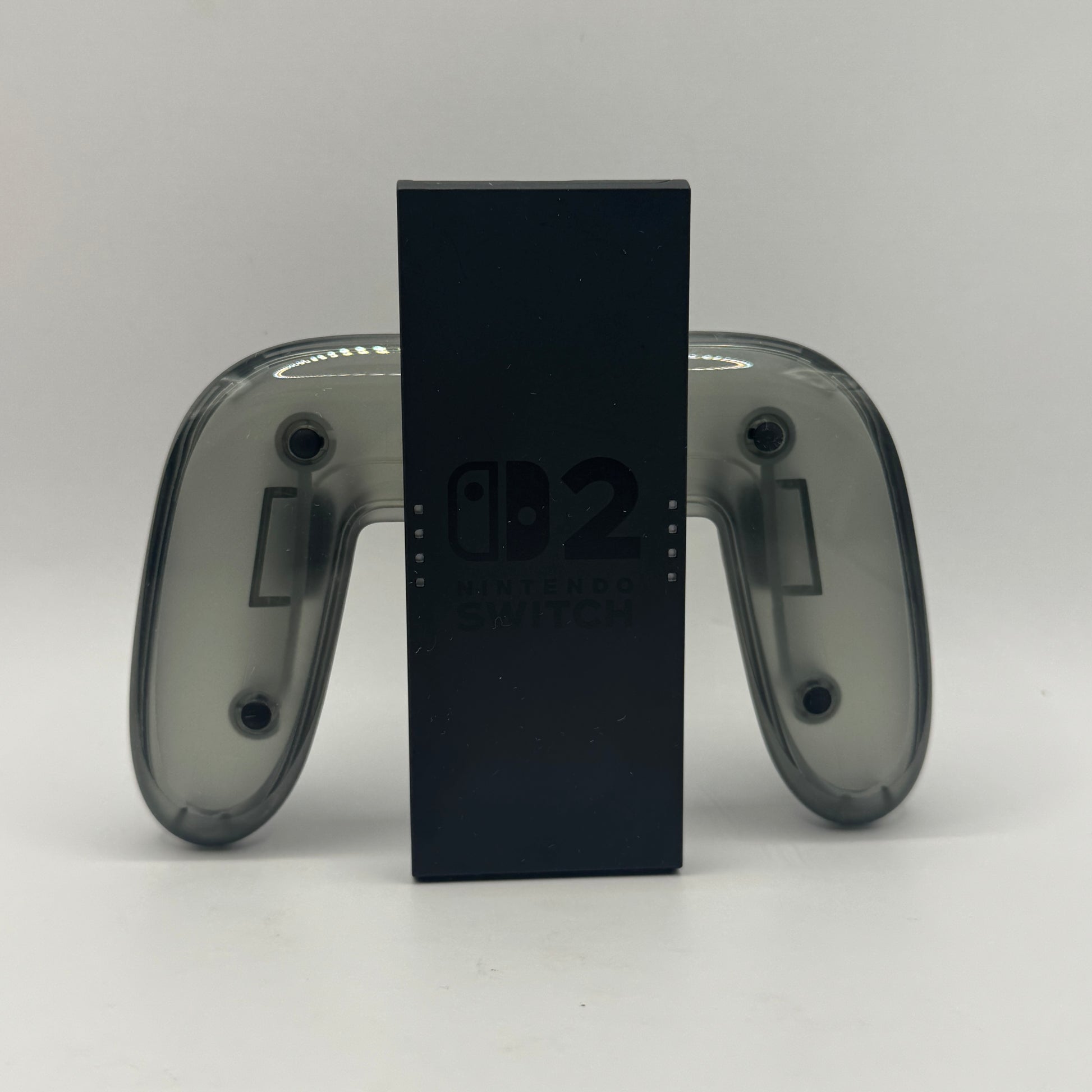 Aufladbarer Joy-Con Grip für Nintendo Switch 2, verbindet zwei Joy-Con-Controller zu einem ergonomischen Gamepad und ermöglicht gleichzeitiges Laden während des Spielens.