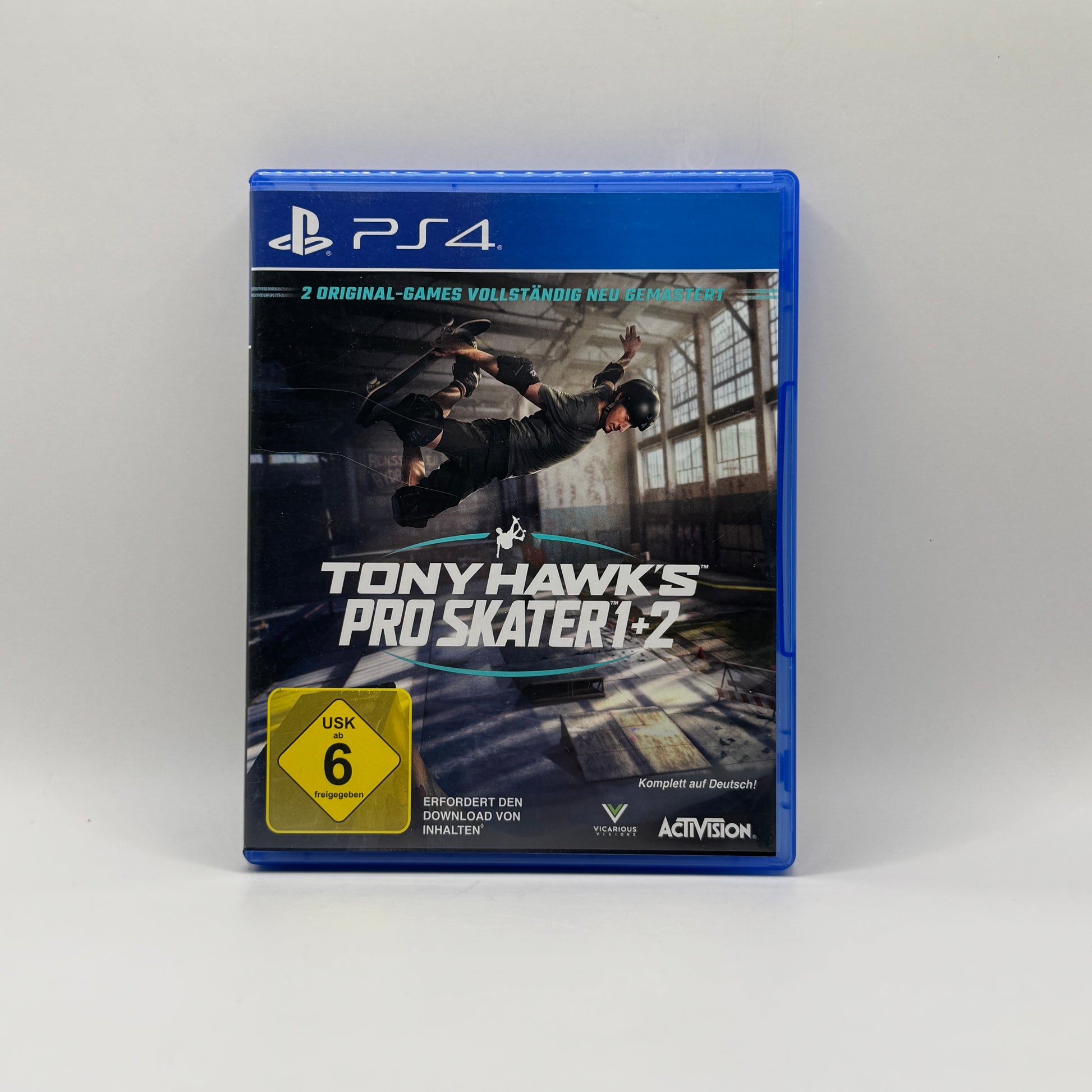 Verpackung des PS4-Spiels Tony Hawk’s Pro Skater 1+2, ein Skateboard-Spiel, in dem Spieler Skateparks erkunden, Tricks ausführen und Highscores in verschiedenen Modi erzielen.
