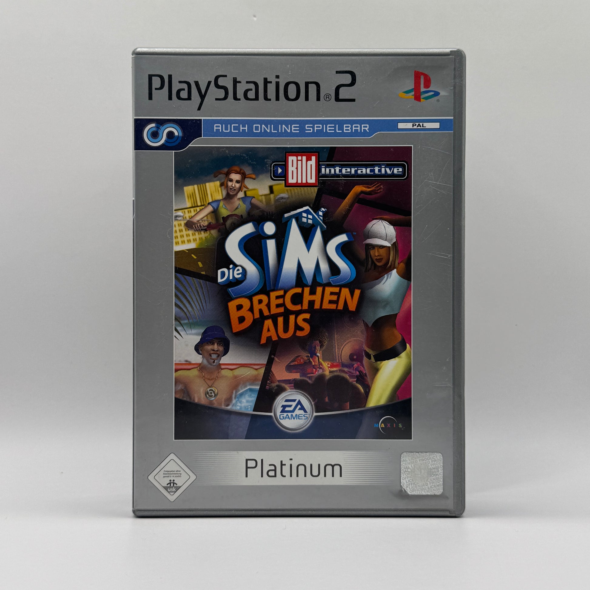 Verpackung des PS2-Spiels Die Sims brechen aus in der Platinum-Edition, eine Lebenssimulation, in der Sims aus dem Alltag ausbrechen, Karrieren verfolgen und neue Orte erkunden.