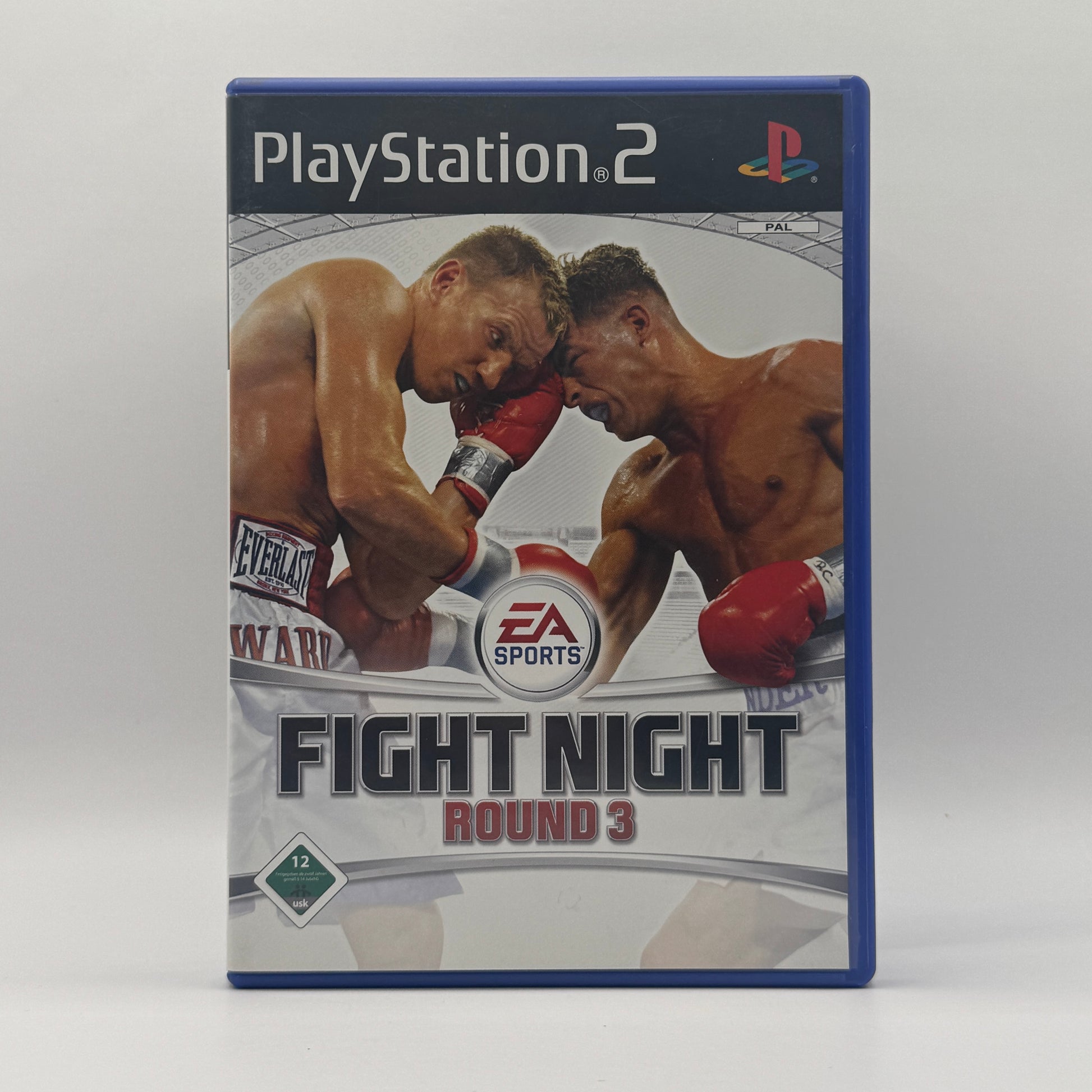 Verpackung des PS2-Spiels Fight Night Round 3, ein Boxsportspiel mit realistischen Kämpfen, verschiedenen Gewichtsklassen und Karriere-Modus.