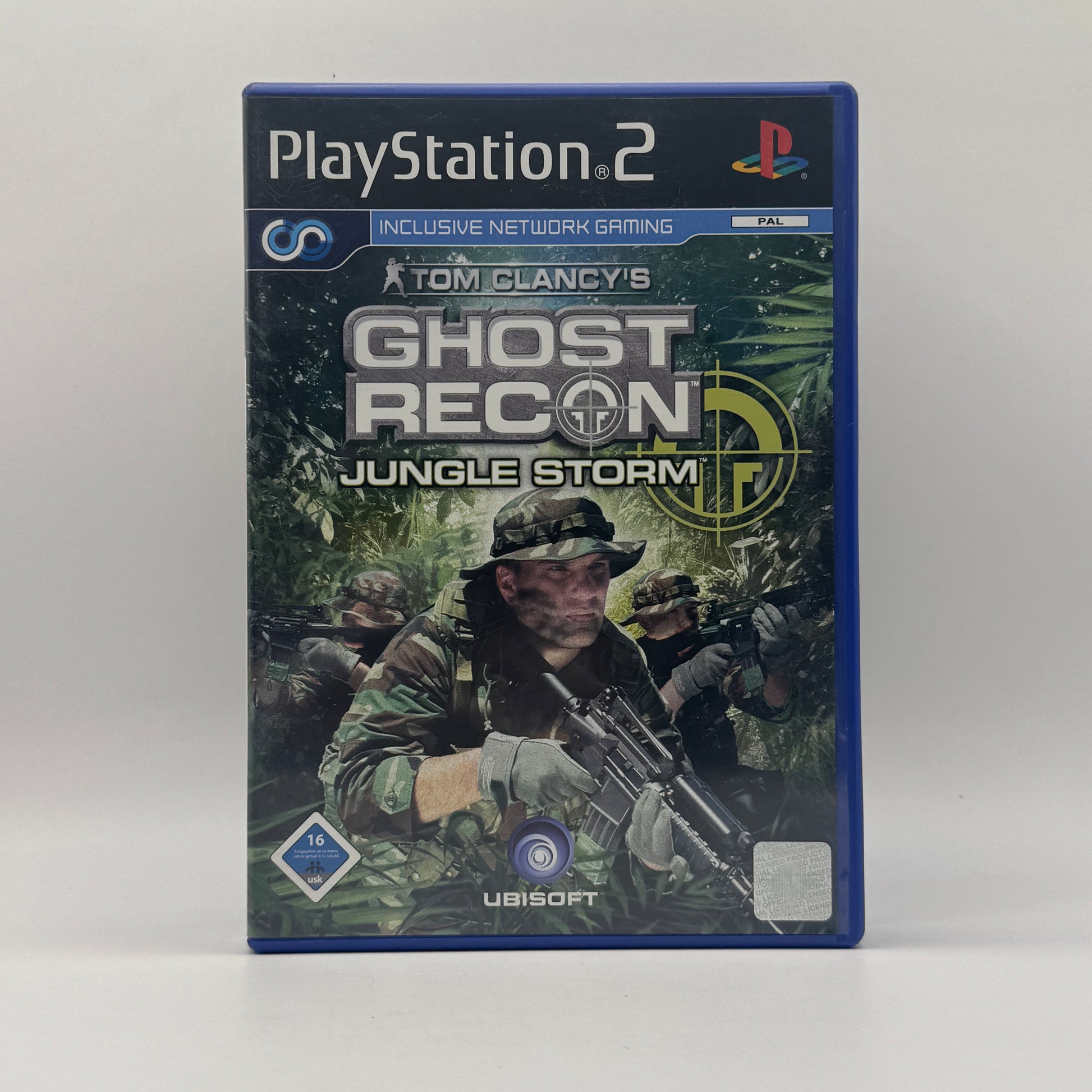 Verpackung des PS2-Spiels Tom Clancy’s Ghost Recon: Jungle Storm, ein taktischer Shooter, in dem Spieler Spezialeinheiten durch Missionen in Dschungel- und Stadtgebieten führen.