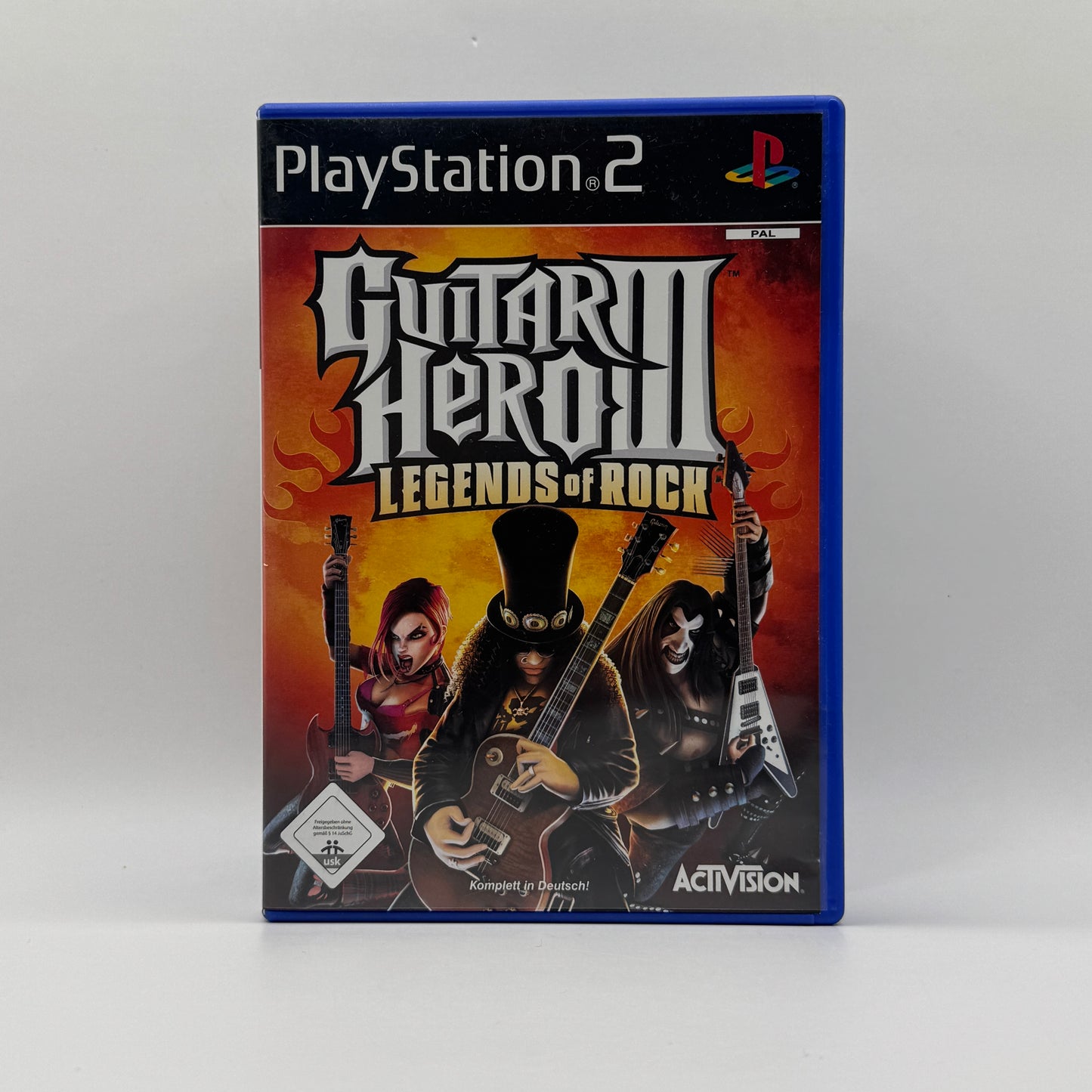 Verpackung des PS2-Spiels Guitar Hero III – Legends of Rock, ein Musik- und Rhythmusspiel, in dem Spieler mit Gitarren-Controller Rock- und Metal-Songs nachspielen.