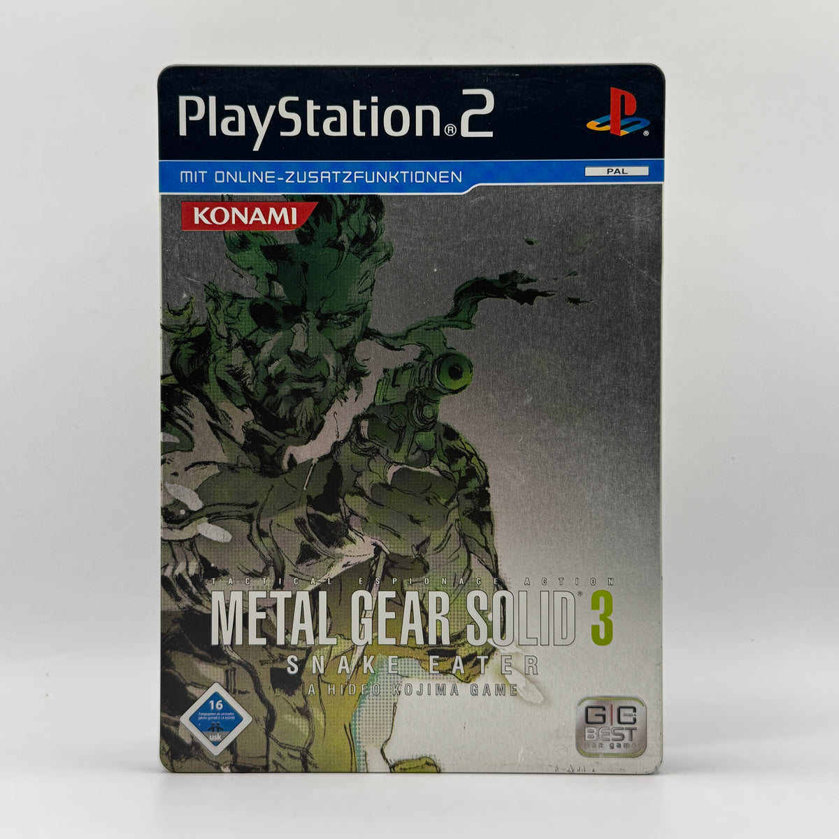 Steelbook-Verpackung des PS2-Spiels Metal Gear Solid 3: Snake Eater, ein Stealth-Actionspiel, in dem Spieler als Naked Snake feindliche Gebiete infiltrieren, Gegner umgehen und taktische Missionen erfüllen.