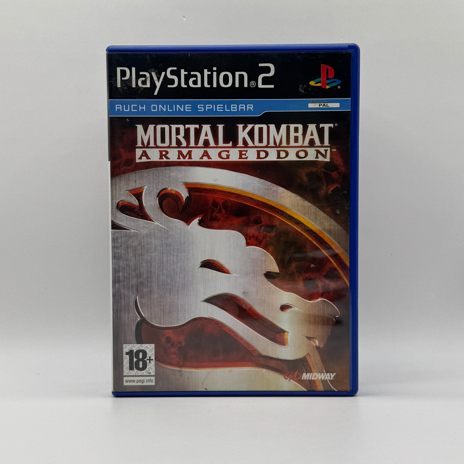 Verpackung des PS2-Spiels Mortal Kombat: Armageddon, ein Kampfspiel mit umfangreichem Charakter-Roster, brutalen Finishern und verschiedenen Spielmodi.
