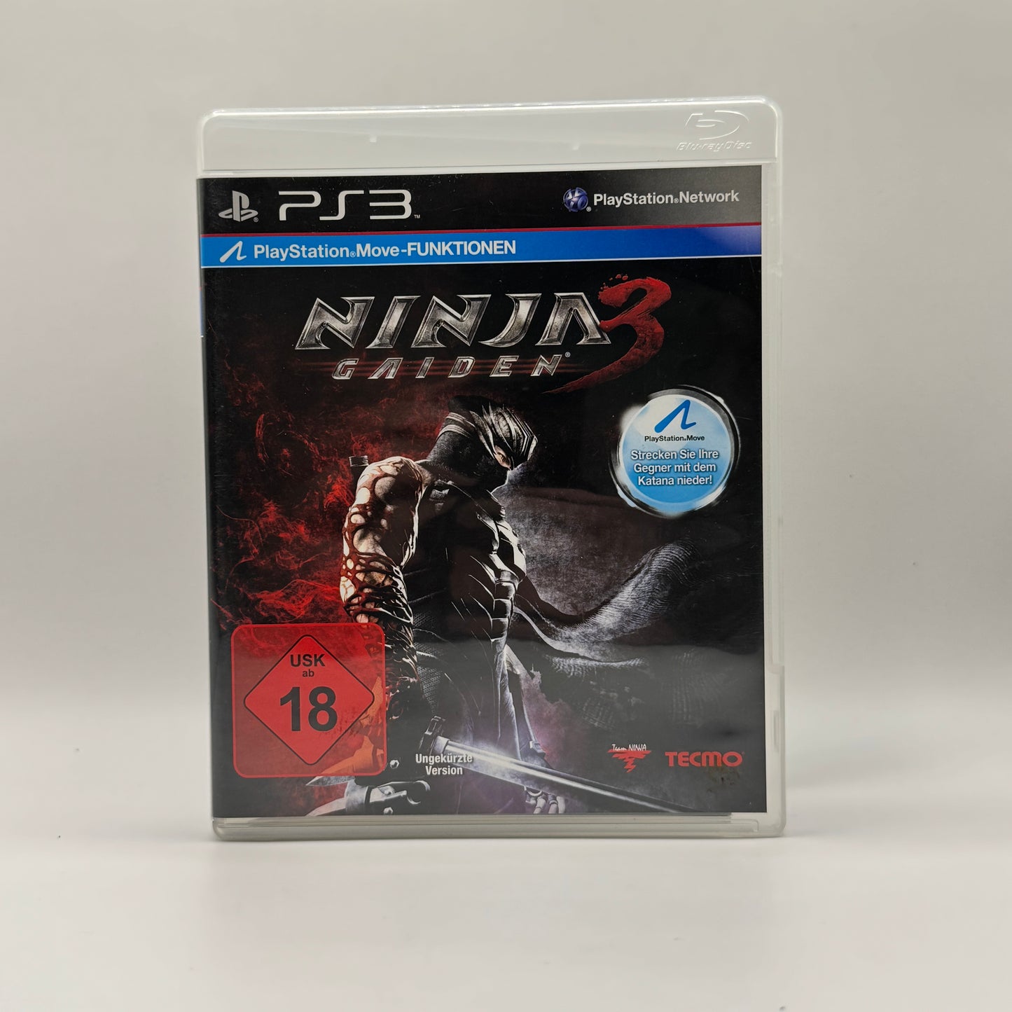 Verpackung des PS3-Spiels Ninja Gaiden 3, ein Actionspiel, in dem Spieler als Ninja Ryu Hayabusa schnelle Kämpfe bestreiten und durch herausfordernde Level kämpfen.