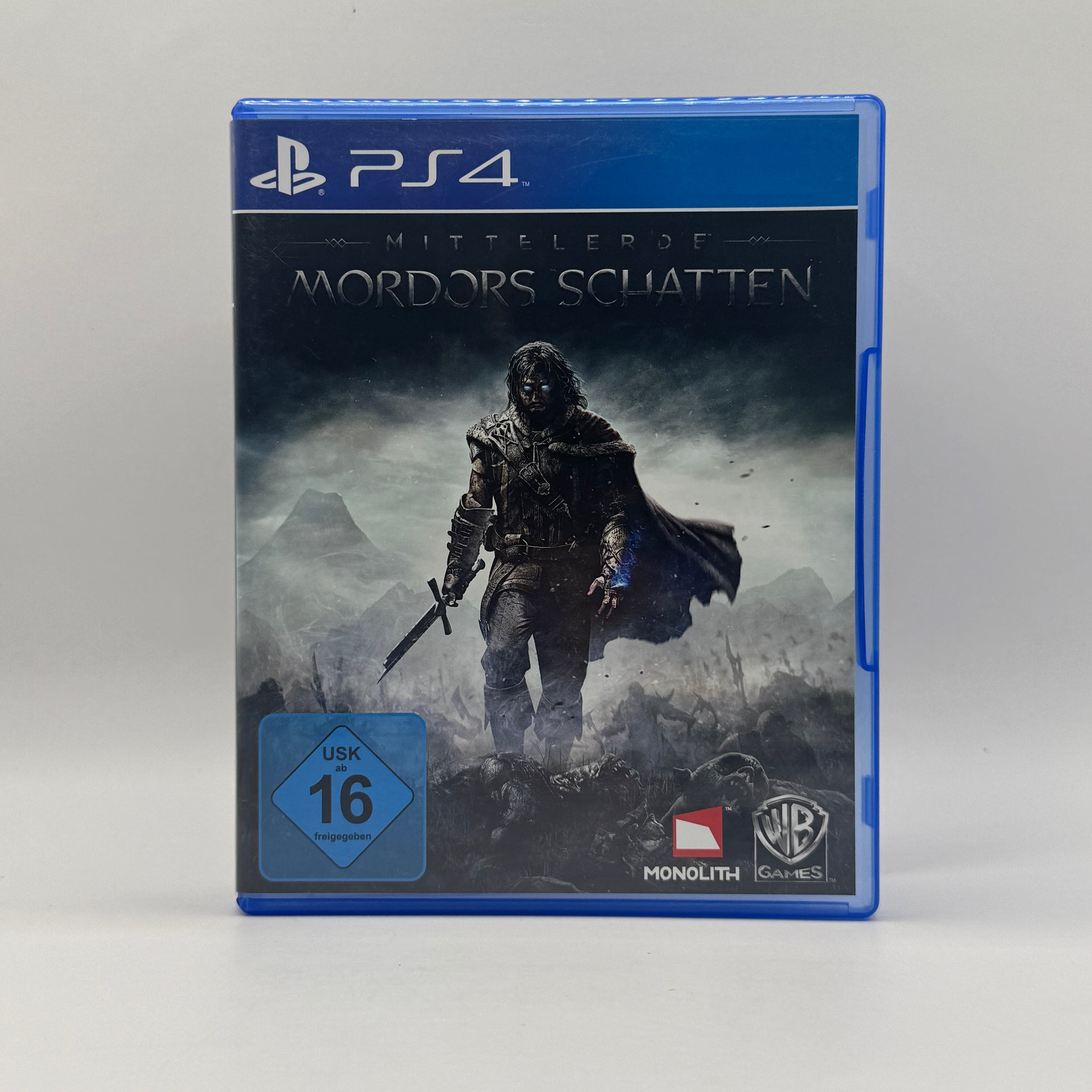 Verpackung des PS4-Spiels Mittelerde: Mordors Schatten, ein Action-Adventure, in dem Spieler als Waldläufer Talion Orcs jagen, Fähigkeiten verbessern und das Nemesis-System erleben.