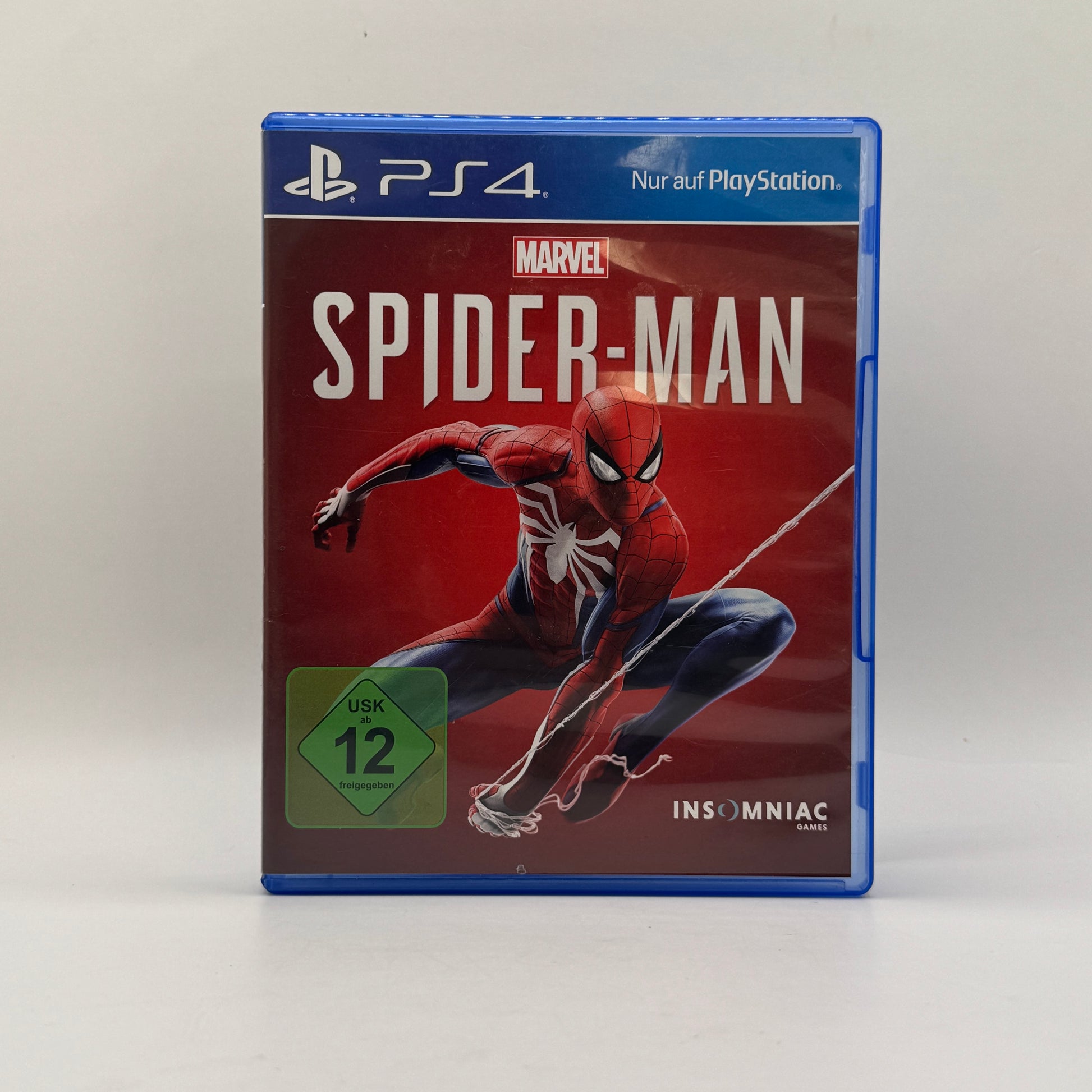 Verpackung des PS4-Spiels Marvel’s Spider-Man, ein Open-World-Action-Adventure, in dem Spieler als Spider-Man durch New York schwingen, Gegner bekämpfen und Missionen absolvieren.