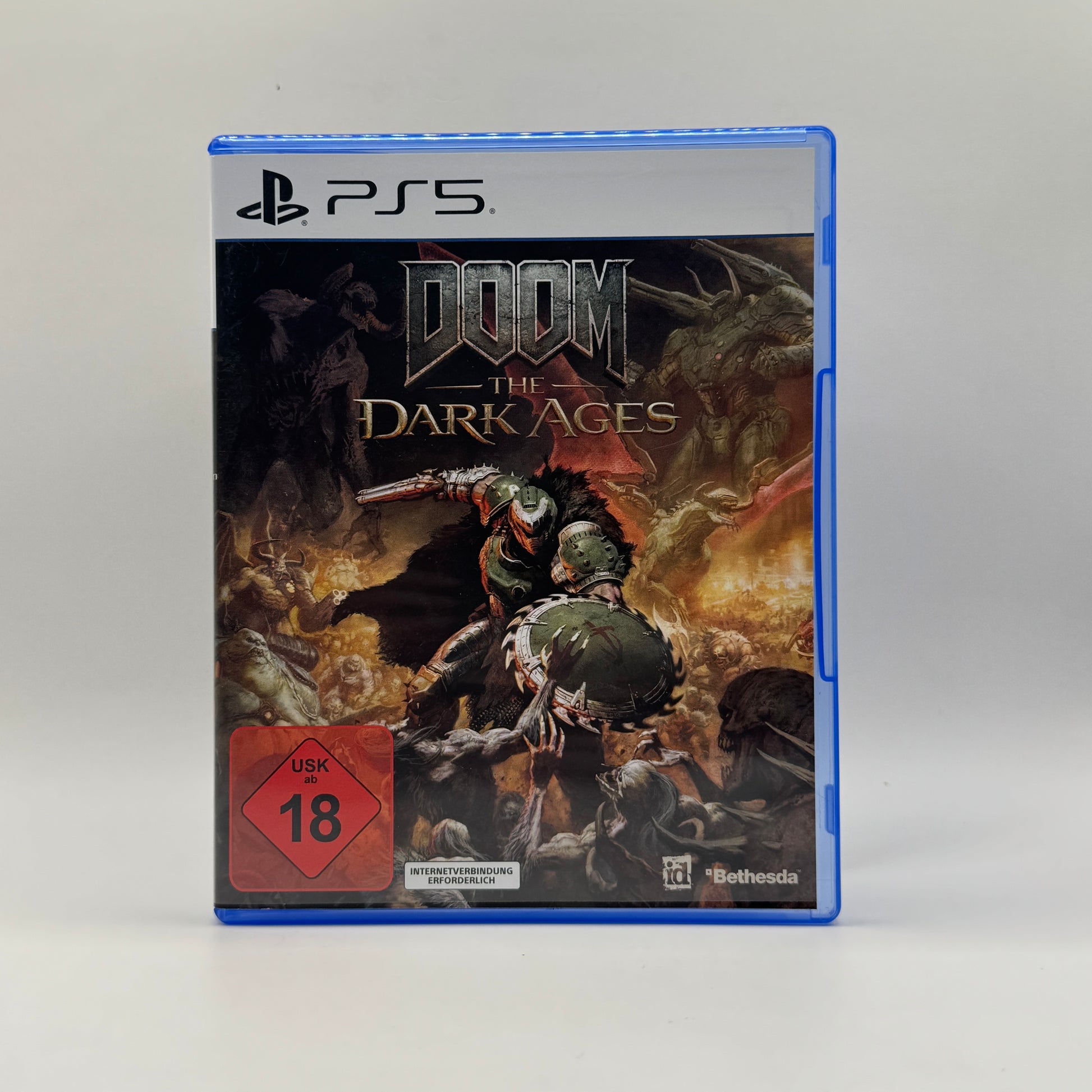 Verpackung des PS5-Spiels DOOM: The Dark Ages, ein First-Person-Shooter, in dem Spieler gegen Horden von Dämonen kämpfen und actionreiche Missionen in düsteren Fantasy- und Mittelalter-Umgebungen absolvieren.