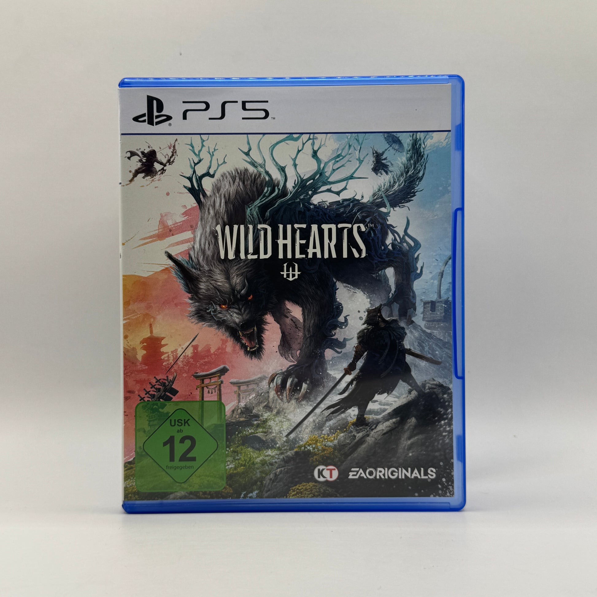 Verpackung des PS5-Spiels Wild Hearts, ein Action-Rollenspiel, in dem Spieler riesige Kreaturen jagen, Waffen herstellen und in einer fantastischen Welt Missionen absolvieren.