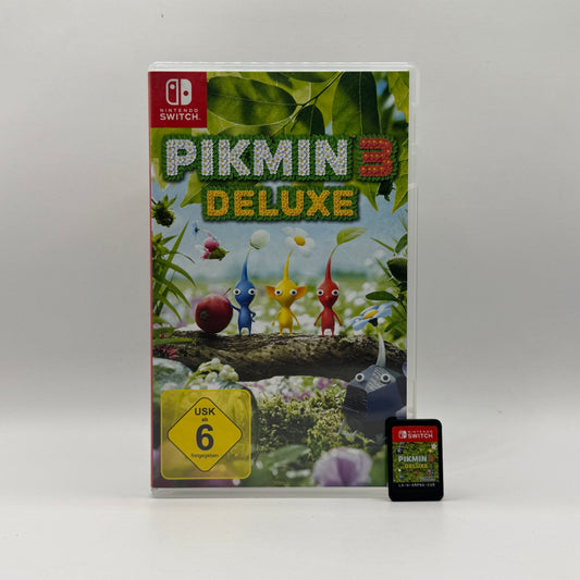 Verpackung des Nintendo Switch-Spiels Pikmin 3 Deluxe, ein Strategiespiel, in dem Spieler kleine Pikmin-Kreaturen steuern, Ressourcen sammeln, Rätsel lösen und Gegner in einer farbenfrohen Welt besiegen.
